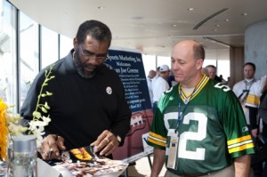 2011 Celebrity Guest Mean Joe Greene Signing Autographs for Guests 